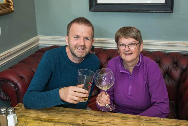 Pat Coombes (69) from Norfolk visits her son Michael Coombes (37) at the Old Customs House in Gunwharf Quays. Picture: Mike Cooter (170521)
