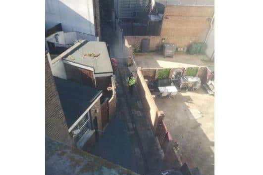 Police in an alleyway in Southsea after an alleged rape on August 29, 2020.