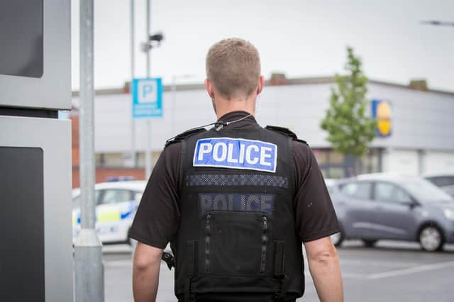 The council approved the collaberation of the Hive and community groups to tackle community safety and cirme issues.
Pictured:  Policemen at Lidl carpark, Derby Road, Portsmouth. Picture: Habibur Rahman