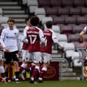 Goal  Northampton Town defender Fraser Horsfall (6) scores a goal and celebrates  3-0 during the EFL Sky Bet League 1 match between Northampton Town and Portsmouth at the PTS Academy Stadium, Northampton, England on 6 March 2021. Picture: Dennis Goodwin