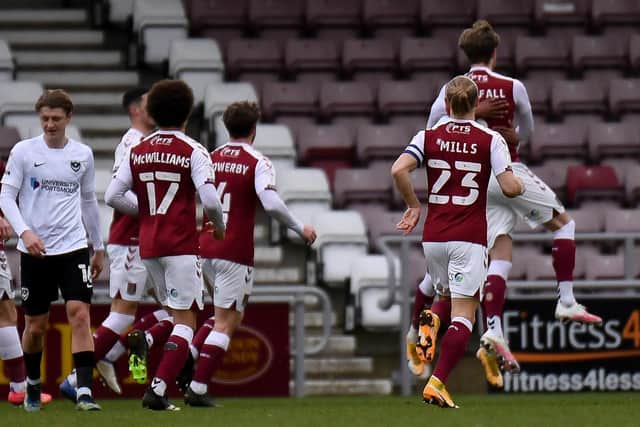 Goal Northampton Town defender Fraser Horsfall (6) scores a goal and celebrates 3-0 during the EFL Sky Bet League 1 match between Northampton Town and Portsmouth at the PTS Academy Stadium, Northampton, England on 6 March 2021. Picture: Dennis Goodwin