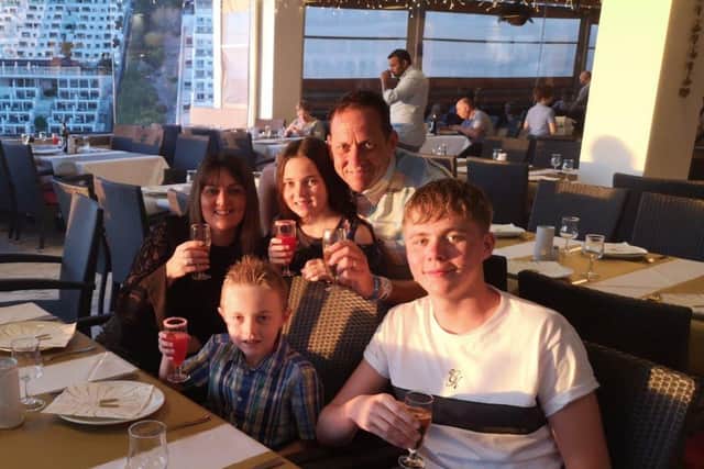 Lisa Hall, 47, with her husband Kenny and children Keira, Joshua and Ryan.