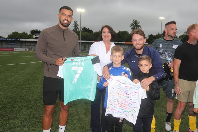 Pompey player Marlon Pack will present's Lenny's mother with a signed shirt, with staff and pupils from Langstone Infant School.