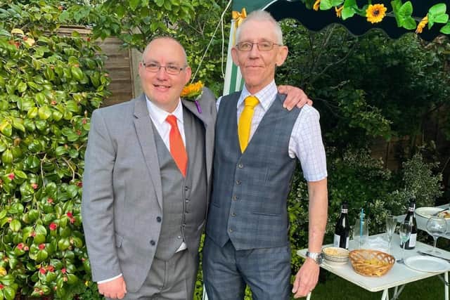 Pictured is Dave alongside his son Mark.