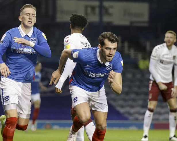 John Marquis celebrates his second goal in Pompey's 4-0 win over Northampton. Picture: Robin Jones