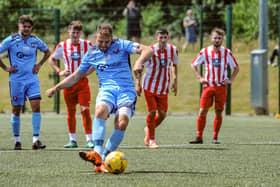 Brett Pitman converts a penalty on his AFC Portchester pre-season debut against Lymington. Picture by Daniel Haswell