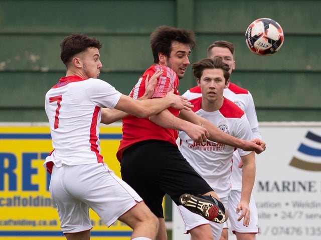 Fareham's Curt Robbins (red). Picture: Keith Woodland