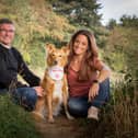 Doggy Lottery has been launched by a pair of cousins hoping to raise funds for rescue centres. Pictured: Lee Brown, Beautie the rescue dog and Lisette van Riel