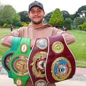 Mikey McKinson with his WBO Global and European and WBC international silver and world youth belts. Picture: Stuart Martin (220421-7042)