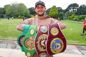 Mikey McKinson with his WBO Global and European and WBC international silver and world youth belts. Picture: Stuart Martin (220421-7042)