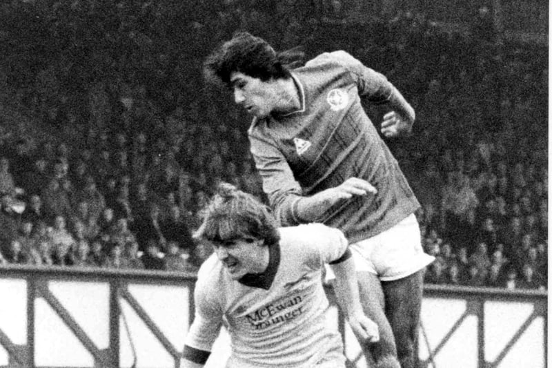Mark Hateley in action for Pompey against Carlisle with the cockeril on his chest