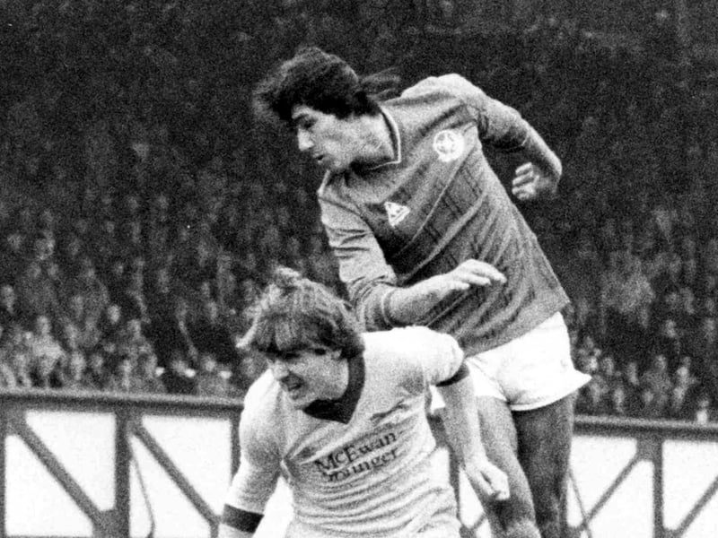 Mark Hateley in action for Pompey against Carlisle with the cockeril on his chest