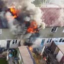 The family of the Chedworth Crescent fire have 'lost everything' after a candle set off an inferno where flames engulfed a bedroom and destroyed the roof. Drone footage of the Chedworth Crescent fire, taken by Jamie Ferry.