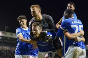 Pompey celebrate their come-from-behind win against Wycombe