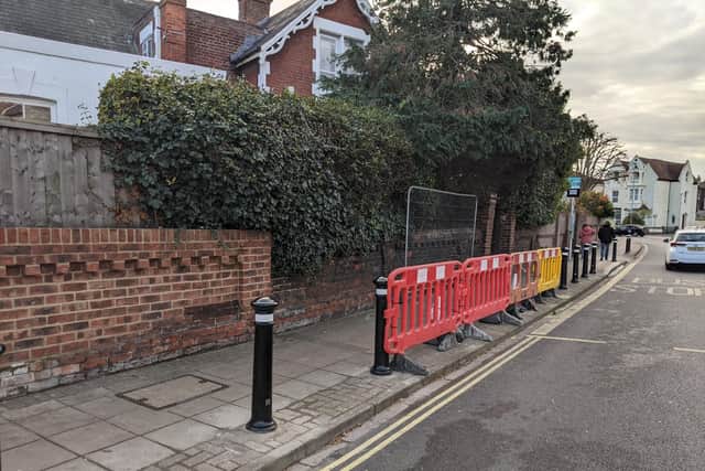 Temporary fences put up on Victoria Road North.