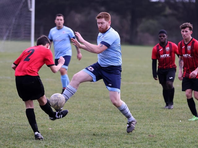 Portchester Rovers (blue) v Horndean United. Picture: Sam Stephenson.