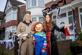 Dave and Louise Whitfield, along with a team of helpers have created a terrifying live action halloween maze in their own back garden.  Pictured - Mr & Mrs Whitfield, with their son Harrison, 12  Photos by Alex Shute