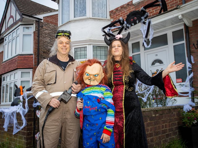 Dave and Louise Whitfield, along with a team of helpers have created a terrifying live action halloween maze in their own back garden.  Pictured - Mr & Mrs Whitfield, with their son Harrison, 12  Photos by Alex Shute