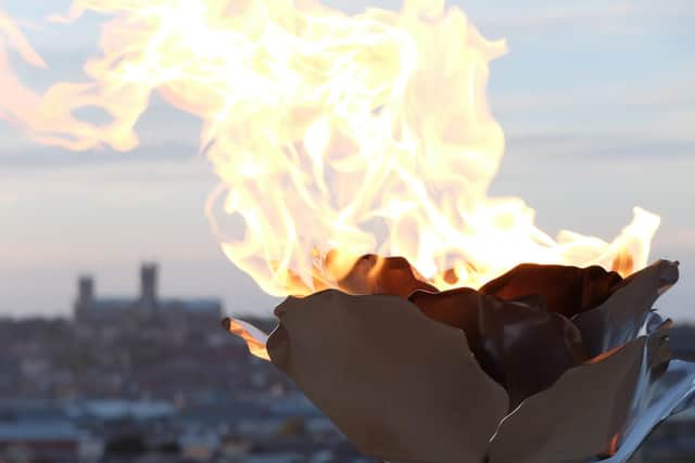 A beacon being lit to mark the Queen's diamond jubilee