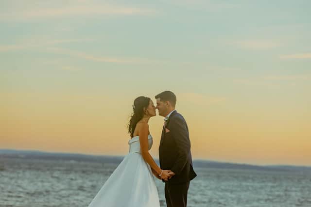 Sarah and Josh on the beach. Picture: Tegan McCann