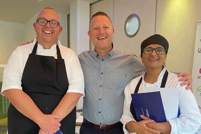 Jim Richardson, left, and Naz Ahmed with Ian Robertson