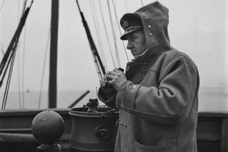 An officer on the deck of a Royal Navy minesweeper during World War II, March 1941.  (Photo by Horace Abrahams/Keystone Features/Hulton Archive/Getty Images)