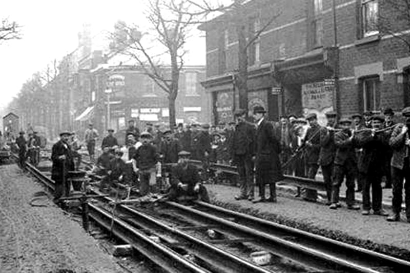 Laying the tram lines in Twyford Avenue on the junction with Wilson Road
