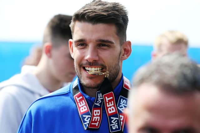 Gareth Evans believes Pompey will be fighting for promotion this season.