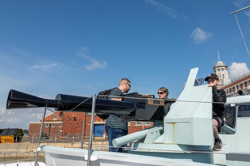 Elliott H (11) takes the gunners seat on the Motor Gun Boat (MGB) 81. Picture: Mike Cooter (08042023)