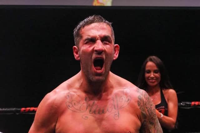 Mickey Parker lets out a roar after his bruising BKB British cruiserweight title win over Dave Thomas