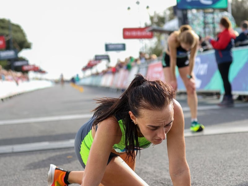 Pictured - Elite womens winner Lily Partridge feeling the burn as she comes home to win the Great South Run Womens Elite Race
Photos by Alex Shute