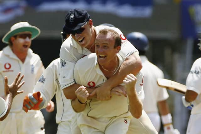 Shaun Udal celebrates with Andrew Flintoff after England's 212-run victory in Mumbai in March 2006 - their largest ever win in India by margin of runs. Photo by Ben Radford/Getty Images.