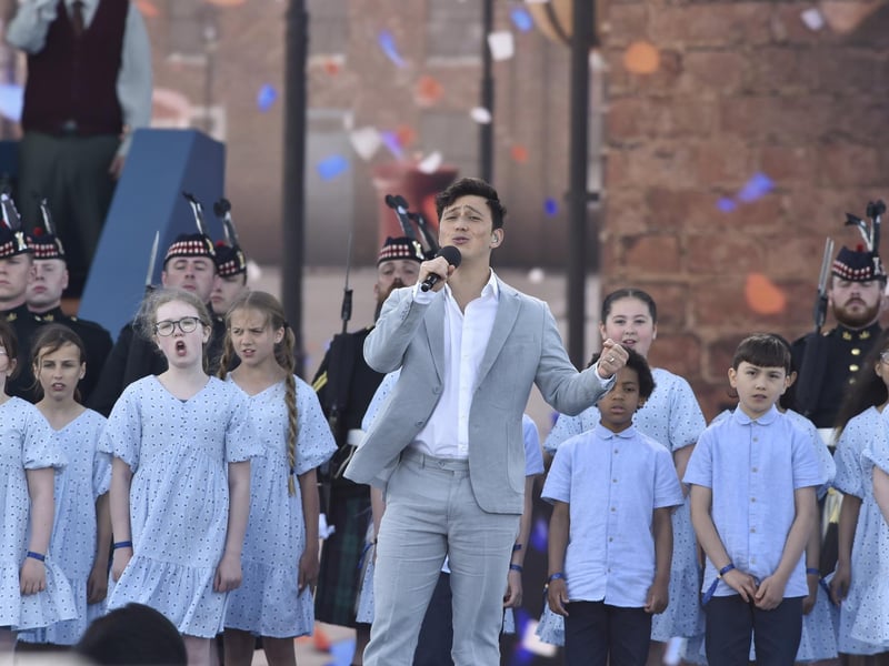 Pictured is: Zak Abel, singer and songwriter, performed with the children's choir during the D-Day 80 commemorations. Picture: Sarah Standing (050624-3828)