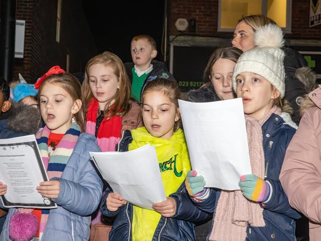 School choirs joined the Denmead Brass Band to sing Christmas carols. Photos by Alex Shute