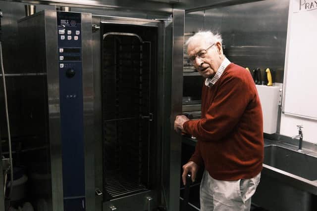 John with one of the ovens that need replacing. Picture: Jonny Simpson