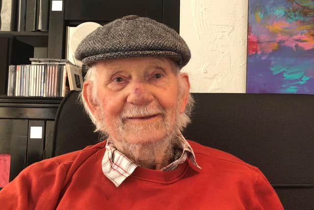 Artist Richard Goss, 86, from Somers Town added a self-potrait to the Somers Town Street Gallery. Picture: PCC