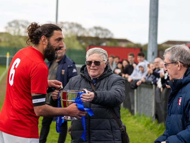 Gosport Town receive the Portsmouth & District FA Trophy. Picture: Alex Shute
