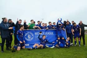 Baffins celebrate with the silverware. Picture by Nathan Lipsham