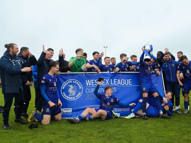 Baffins celebrate with the silverware. Picture by Nathan Lipsham