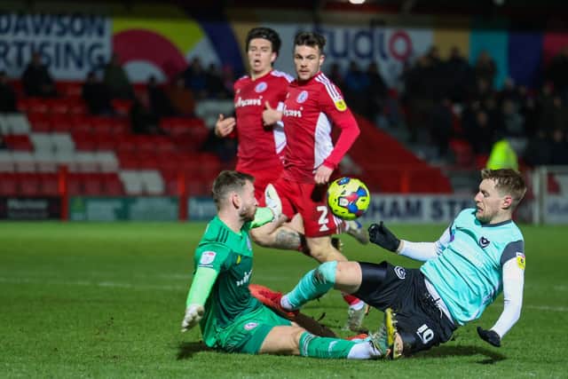 The challenge which saw Joe Pigott dismissed against Accrington.