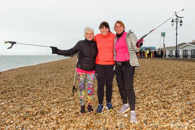 Southsea Beach Clean on Southsea beach near to the Rock Gardens - (l-r) Jan Parker, Bev Hughes and Sarah Kinch were doing the beach clean after finishing the Southsea Parkrun. Picture: Vernon Nash (070320-003)