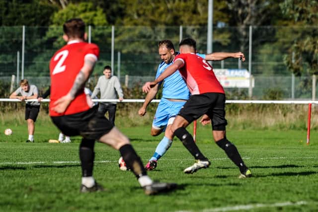 Brett Pitman about to score one of his four FA Vase goals against East Cowes. Picture by Daniel Haswell.
