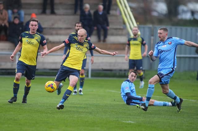 Centre half Harry Birmingham, seen here in action against Portchester last weekend, is unavailable for this Saturday's trip to Portland.
Picture: Stuart Martin