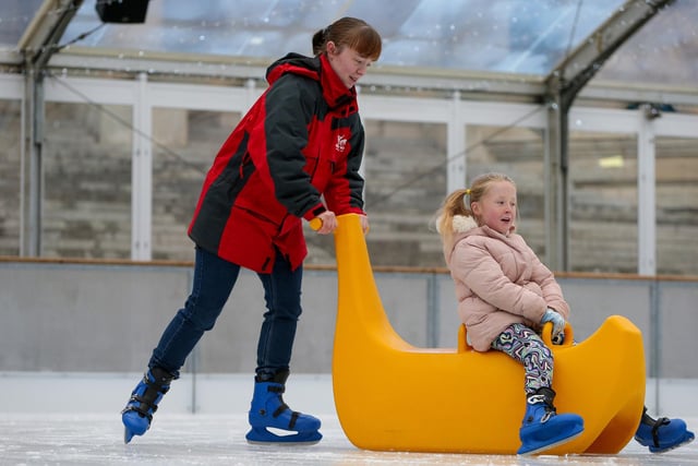 Portsmouth On Ice officially opens, Guildhall Square, Portsmouth Pictured: Emily Kendall and her niece, Evie, 6 Picture: Chris Moorhouse (231124-18)