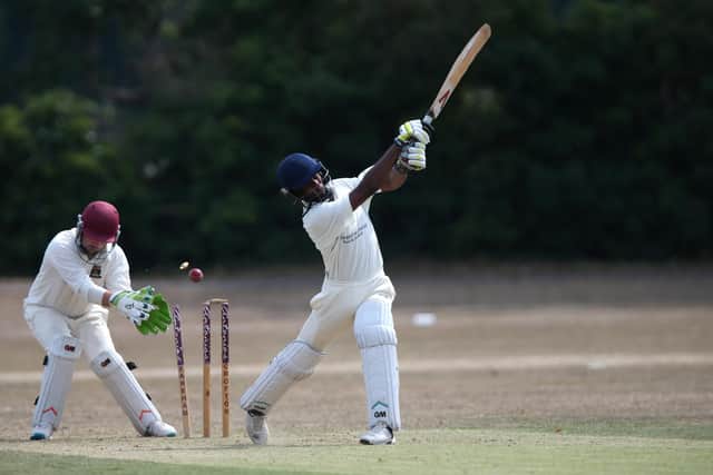 Bedhampton's Syge Bologne is bowled by Fareham & Crofton's Morgan Frost during their Hampshire District League encounter at Bath Lane.
Picture: Chris Moorhouse