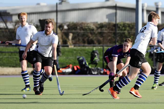 Harry Hellyer (purple) in action for Portsmouth 1sts against Southampton in 2019/20. Picture: Chris Moorhouse