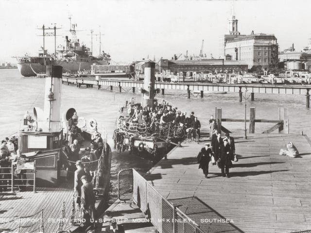 The Gosport ferry with the USS Mount McKinley in the background