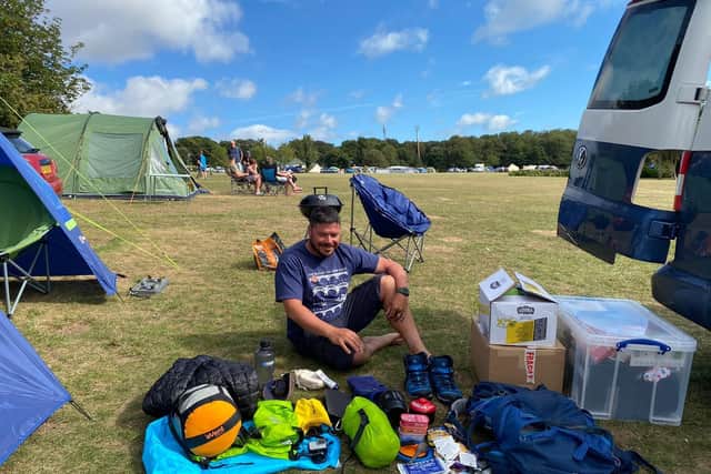 Chris Howard has a 'kit changeover' during his 11,000 mile trek for Children in Need.
