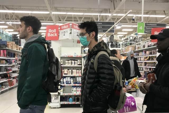 A man wearing a face mask an ASDA in London. Picture: Kirsty O'Connor/PA Wire