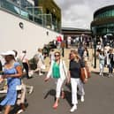 Spectators arrive during Day One of The Championships Wimbledon 2022 at All England Lawn Tennis and Croquet Club on June 27, 2022 in London, England. (Photo by Julian Finney/Getty Images)